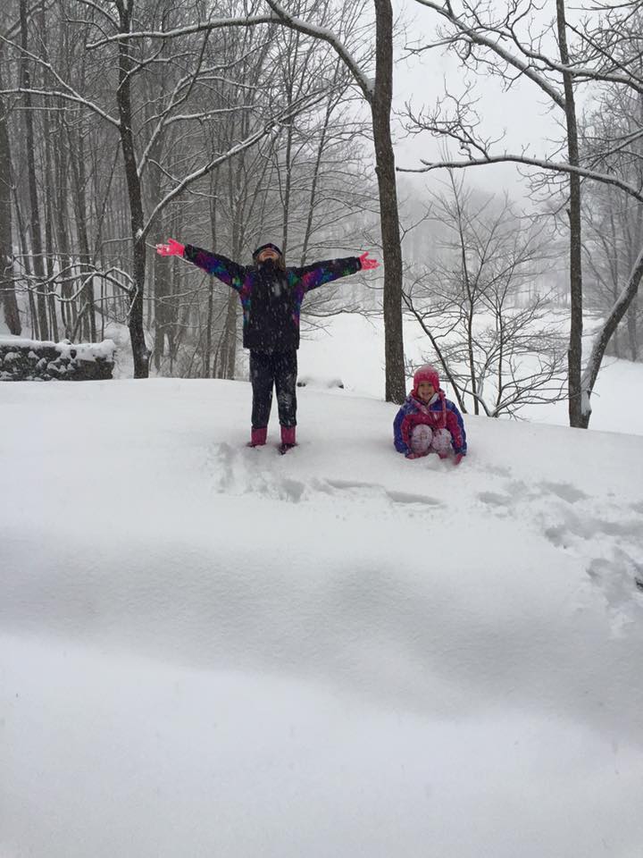 Having Fun: Two LC youngsters have fun on one of four recent snowdays.